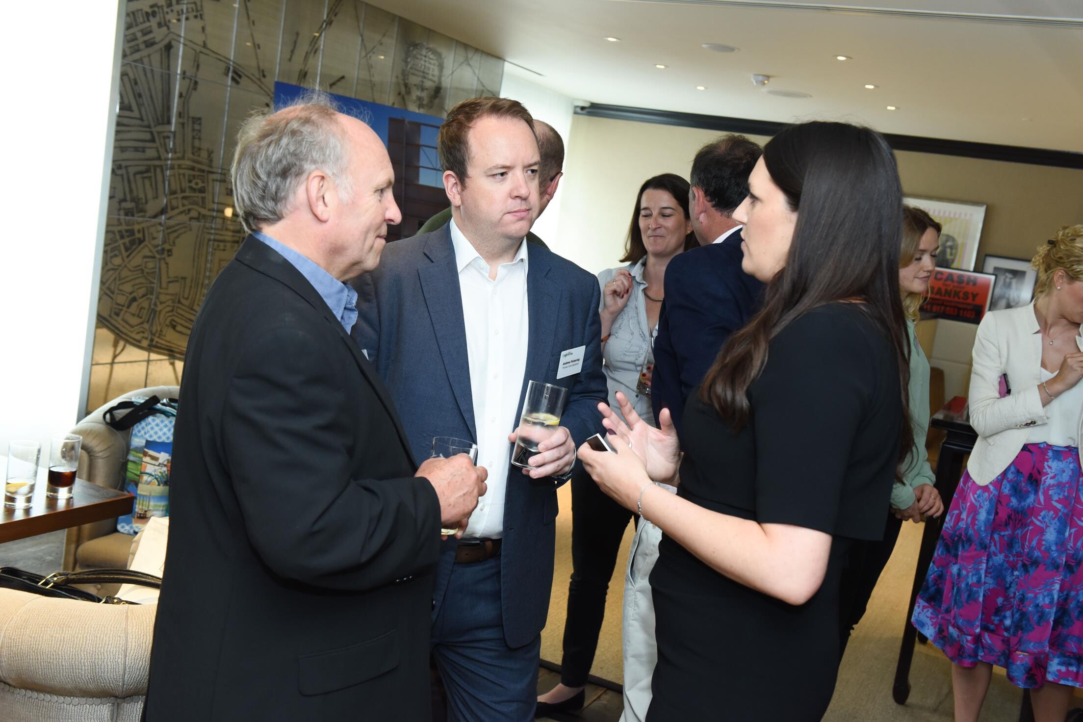 PM Lunch_Colin Burr Winged Boots and Andrew Pickering Thomas Cook Signature talking to Joanna Cooke of Visit California (Copy).jpg