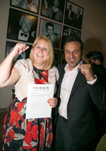 Louise Vernon Winner of 2 Sardatur flights from Manchester to Sardinia with Sardatur Holidays Managing Director Gianni Bonuglia.jpg