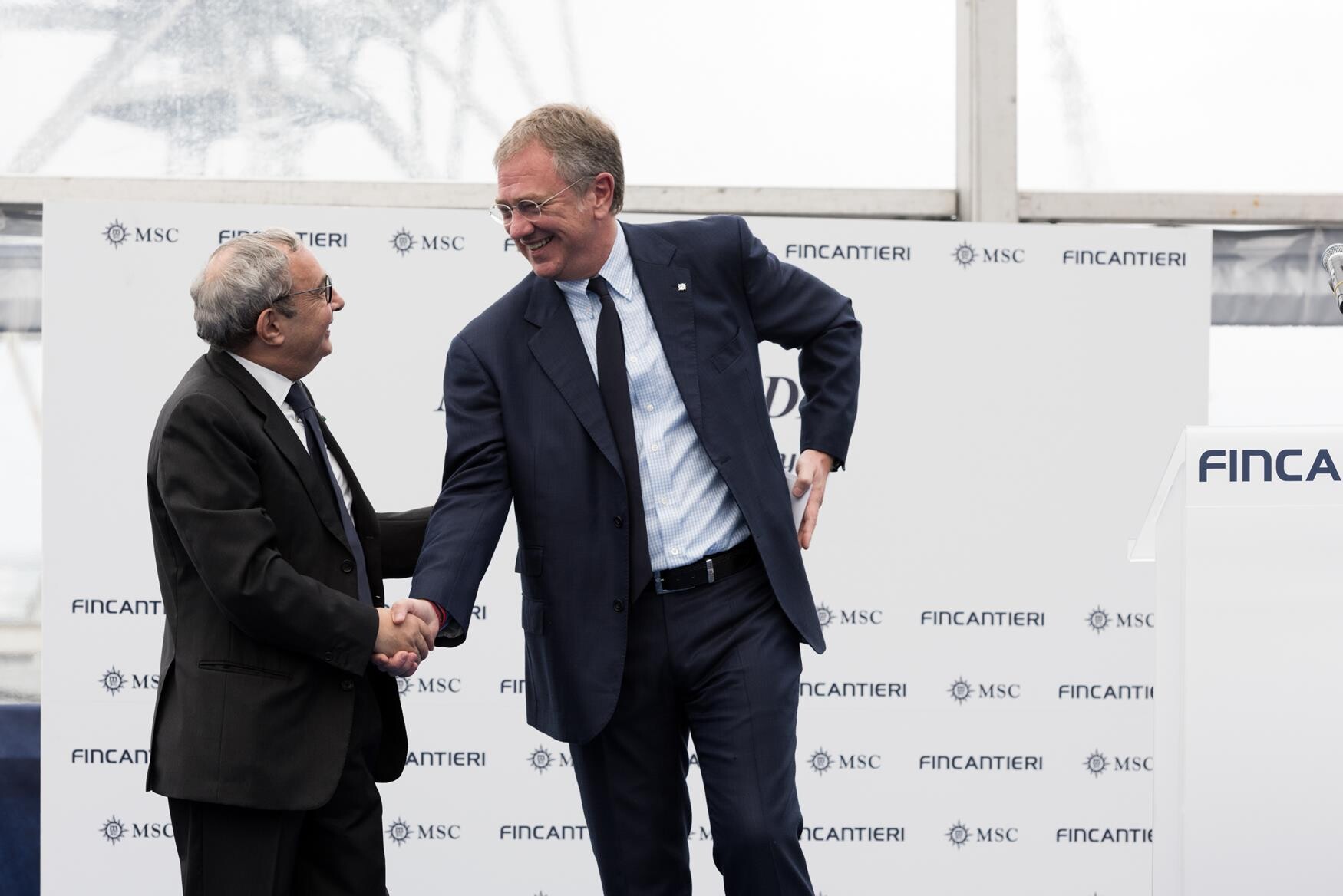 12e37b993dcca429d718b78961ba5ced_06_Mr.-Vago-MSC-Cruises-Chairman-and-Mr.-Bono-CEO-of-Fincantieri-celebrating-the-partnership-of-the-shipyard-with-the-cruise-company-to-build-the-Seaside-generation