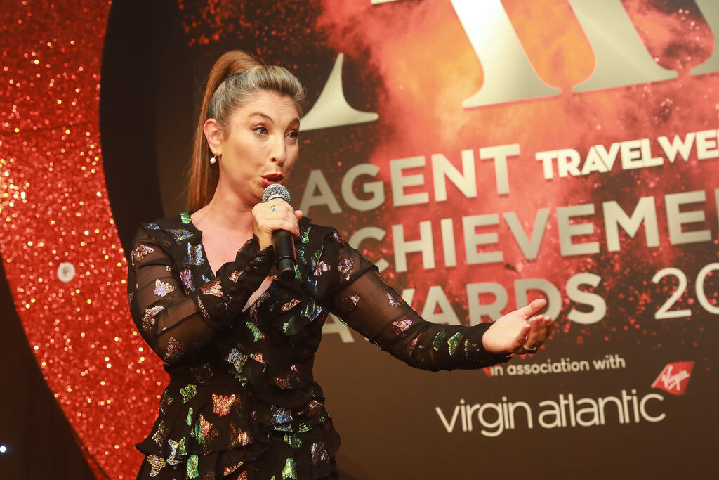 ec319ee18f57b7c97f1ea516069890ba_AgentAchievementAwards2022_Singer12