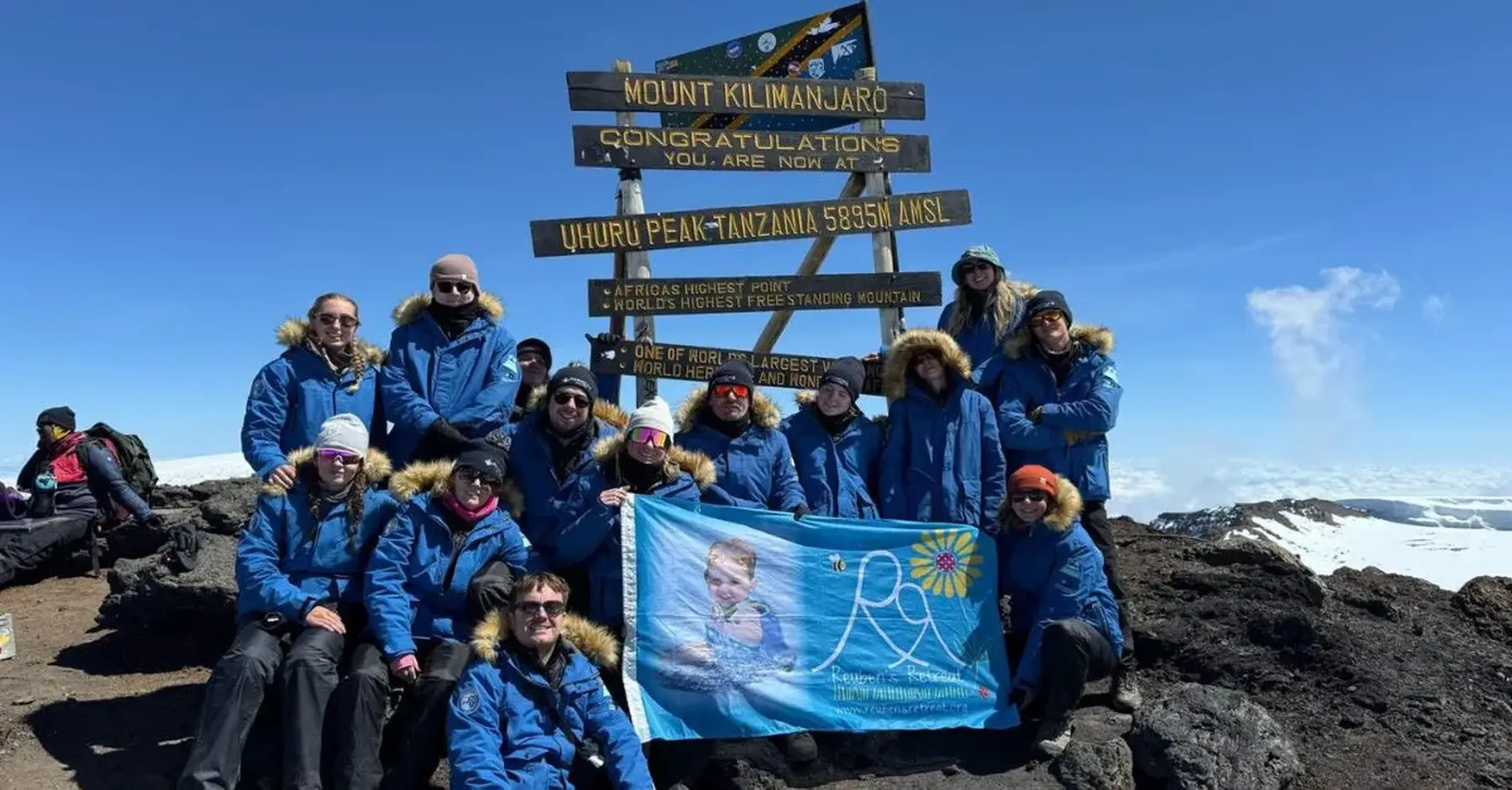 Panache Cruises at Mount Kilimanjaro summit resized.