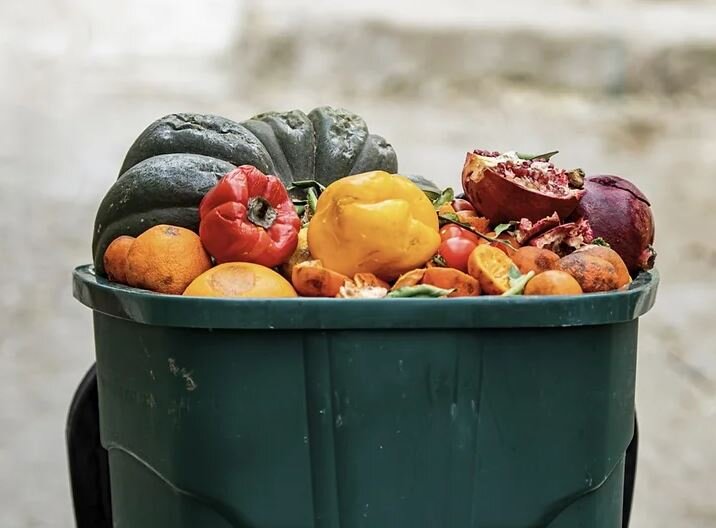 How does food waste contribute to global emissions?