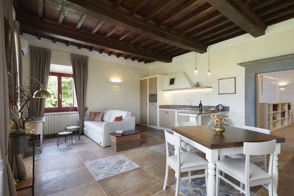 125dTenutaDiArtimino_MeliaCollection-Borgo_One_Bedroom_Caterina_Suite_living (1).jpg