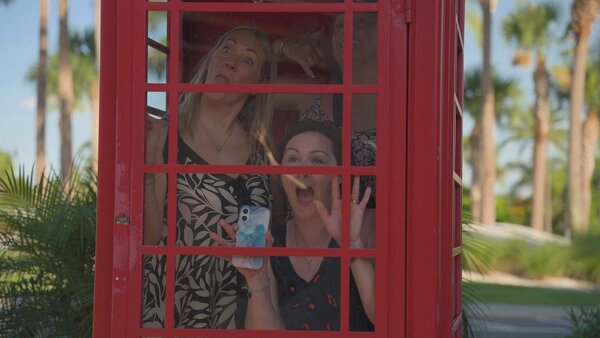 Sarah Hart, Lavinia Chew and Gemma Larder completing a photo challenge in Sunset Walk
