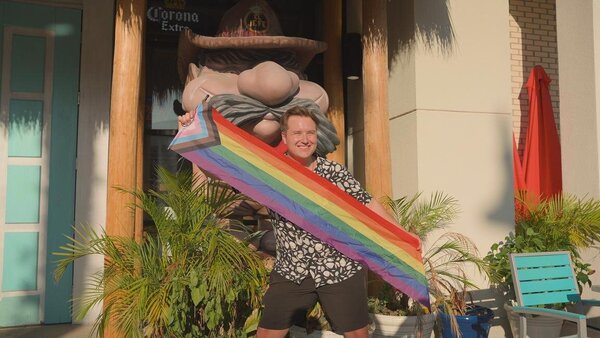 Sam Griffiths from Cruise1st completing a photo challenge in Sunset Walk