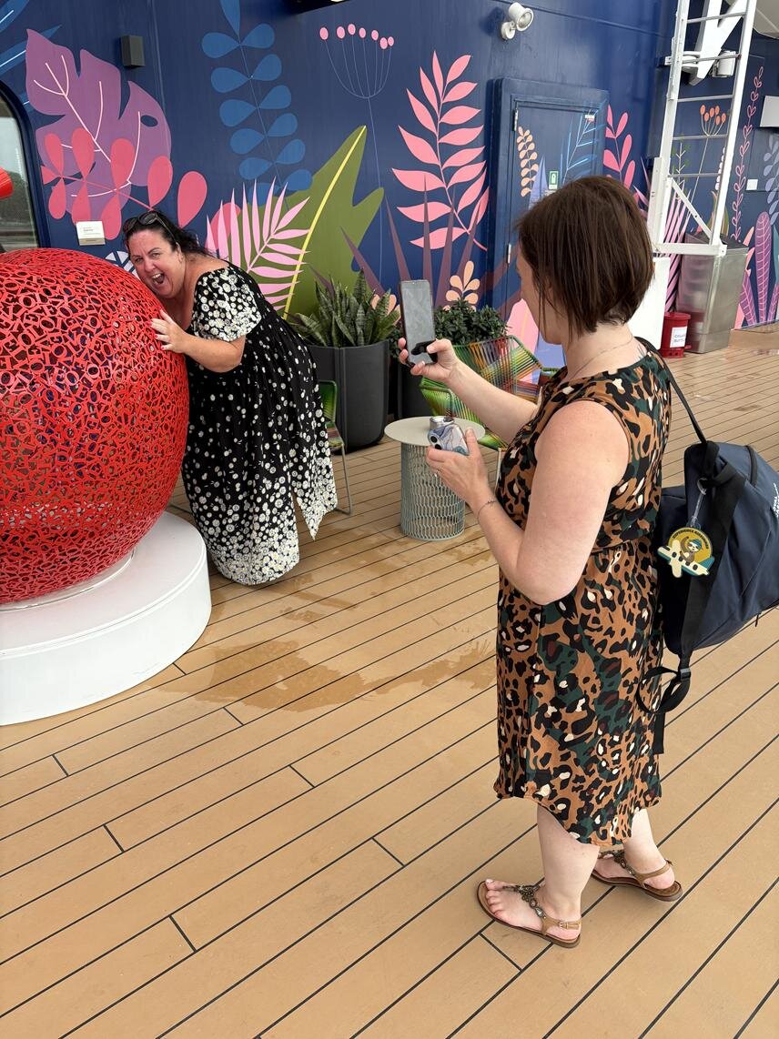 Katie Longstaff from Cruise118 completing a photo task on Celebrity Beyond