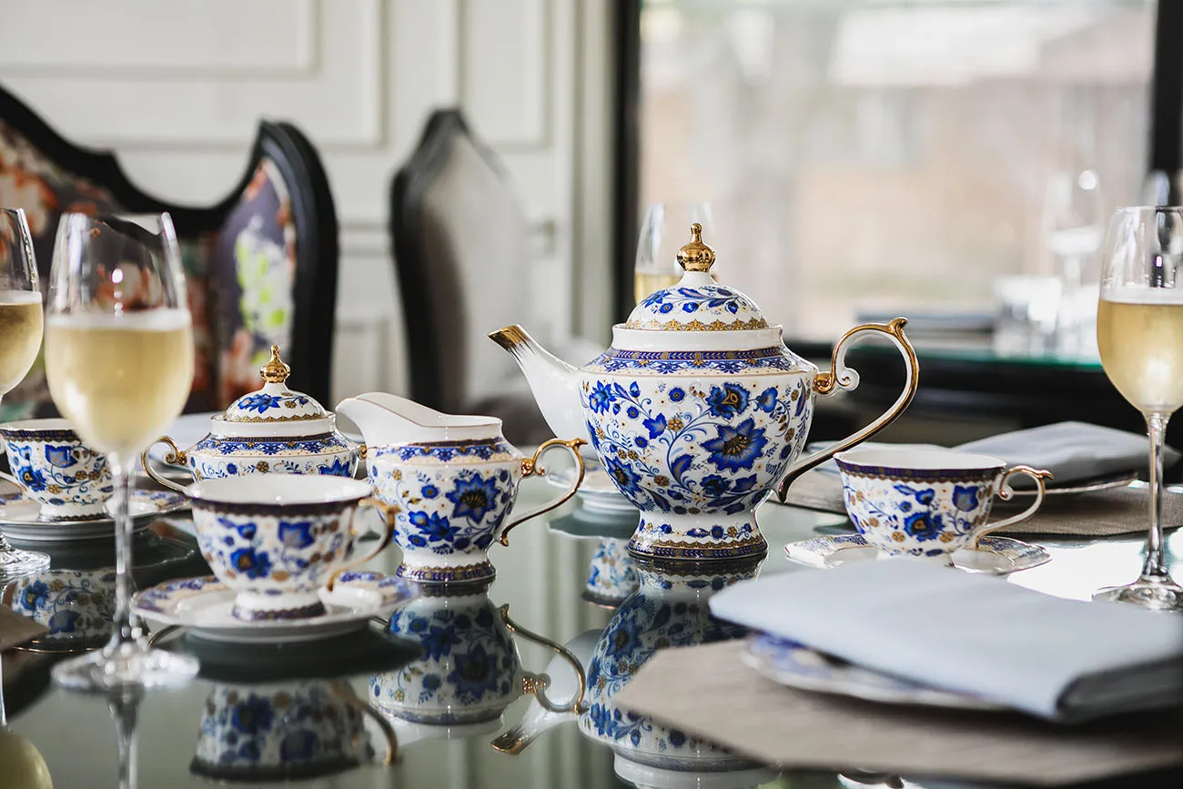 Emma Jane offers traditional tea service with a glass of bubbles
