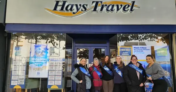 Hays agencies raise thousands with walk, afternoon tea and ‘quingo’
