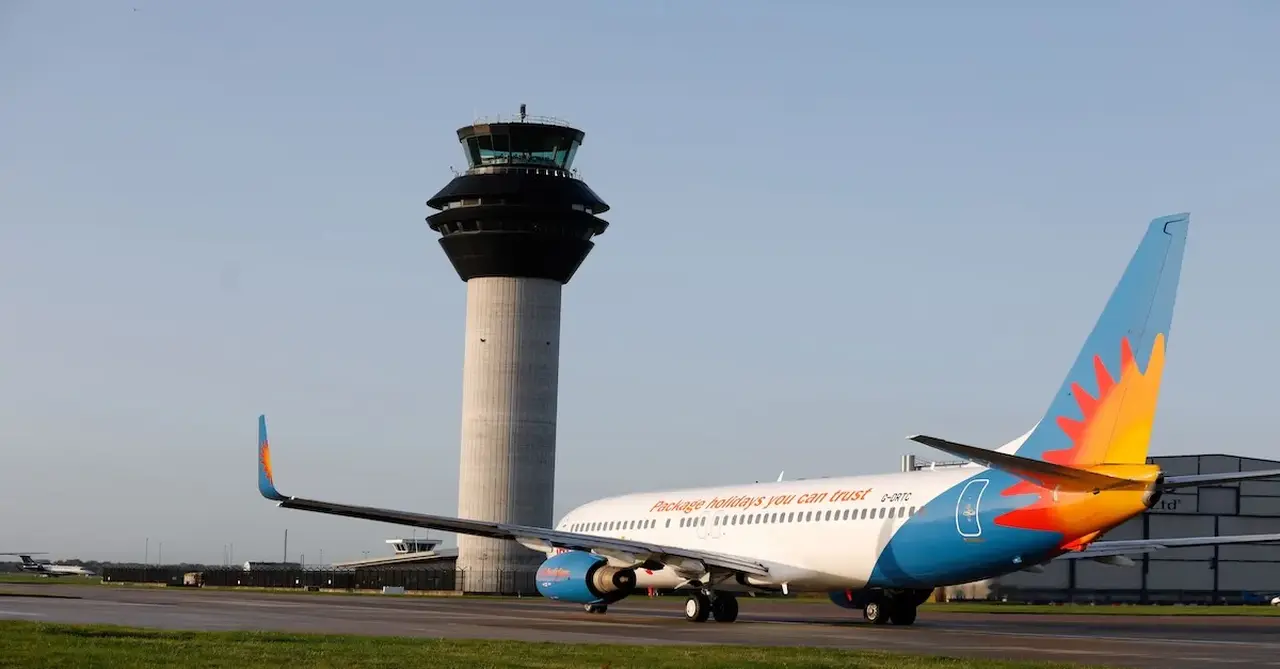Manchester Airport ATC tower with Jet2 aircraft 29 Septermbe