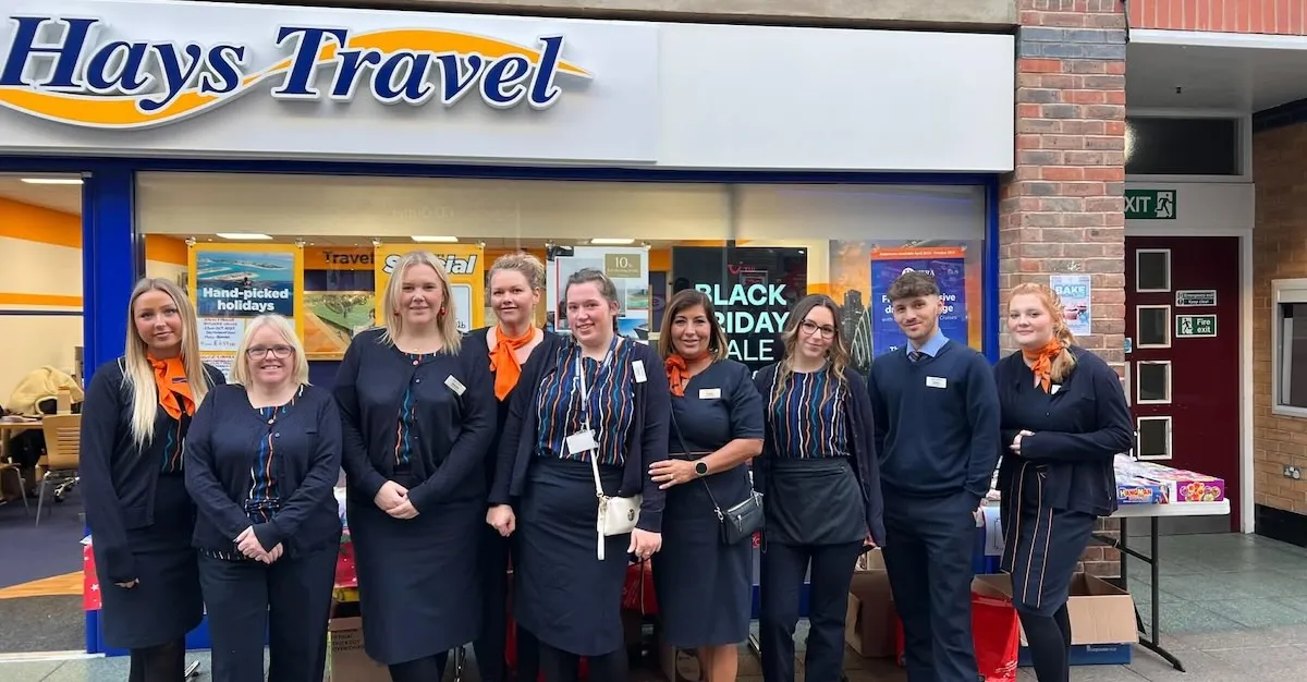 Hays agents raise thousands for hospice and food bank