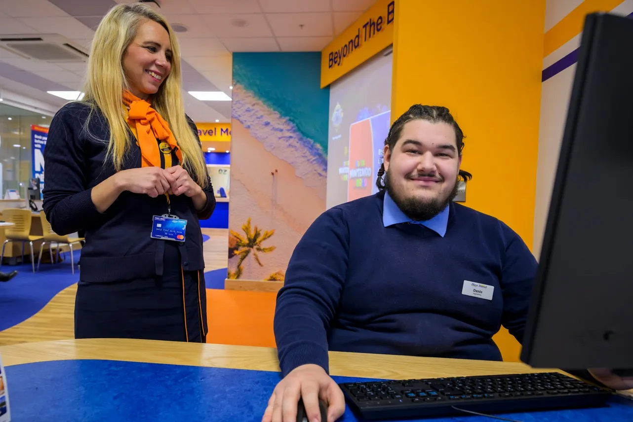 Hays Travel's Katrina Pike with apprentice Denis Zaiacz