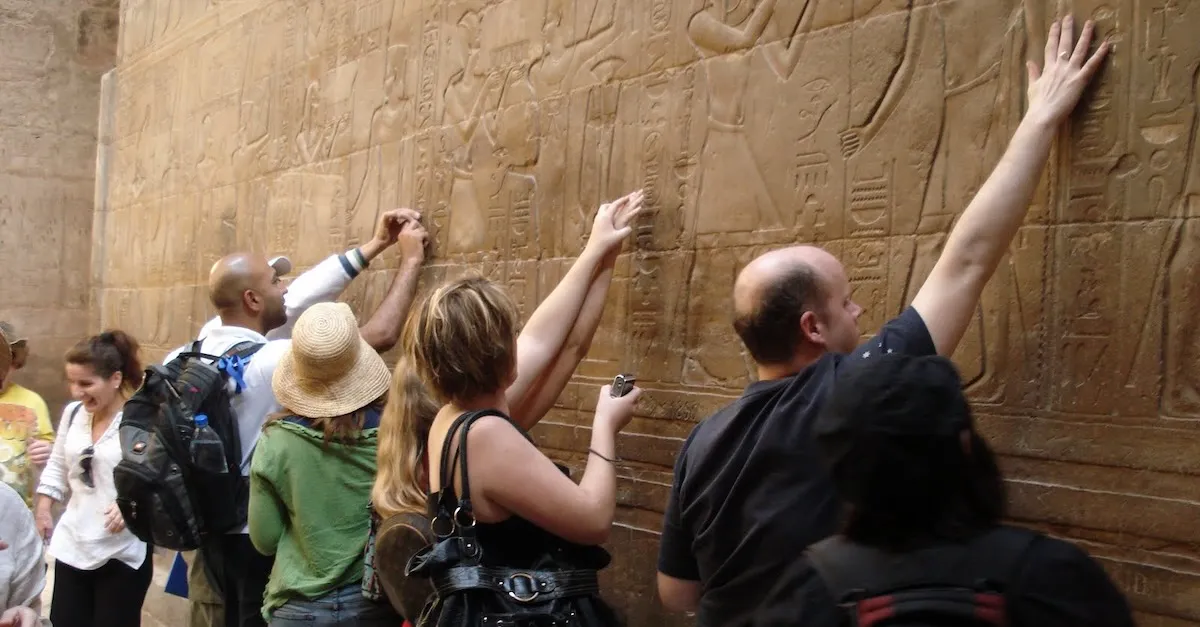 Traveleyes Group touching wall in Egypt 1