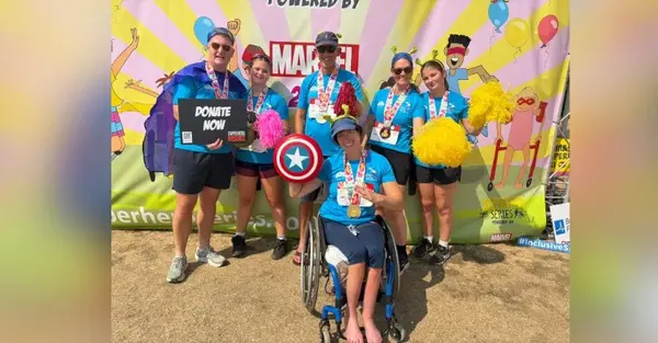 Iglu Ski team completes superhero-themed triathlon